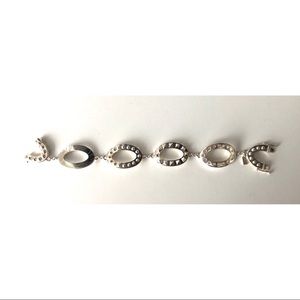 Coach- Curved Studded Silver Bracelet